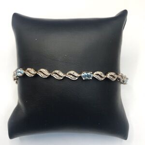 Gold Over 925 Sterling Silver Blue topaz Infinity Link Tennis Bracelet Size 7”
